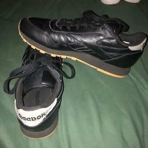 Black Reebok sneakers